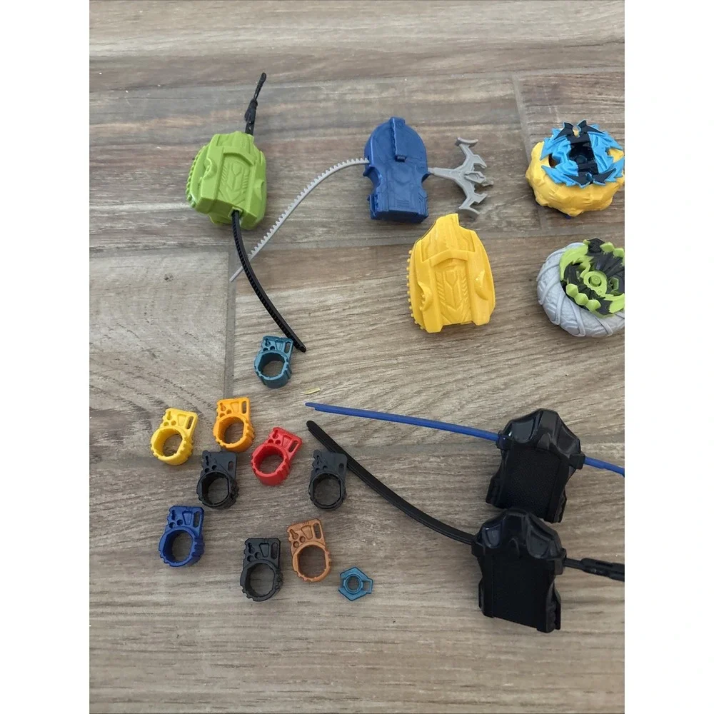 Vintage Hasbro Beyblade Lot Launchers & RIP Cords Various Sizes Colors 33 Pieces